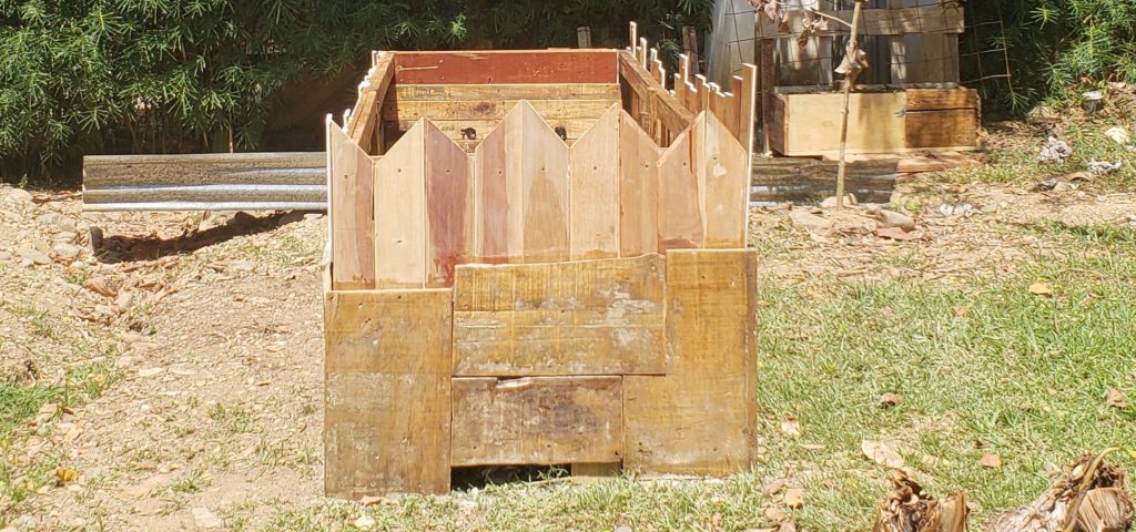 how to upcycle a raised garden bed - add siding