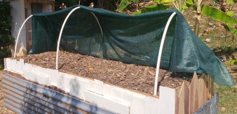 how to upcycle a raised garden bed featured image