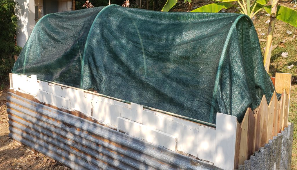 how to upcycle a raised garden bed - hoop enclosure closed