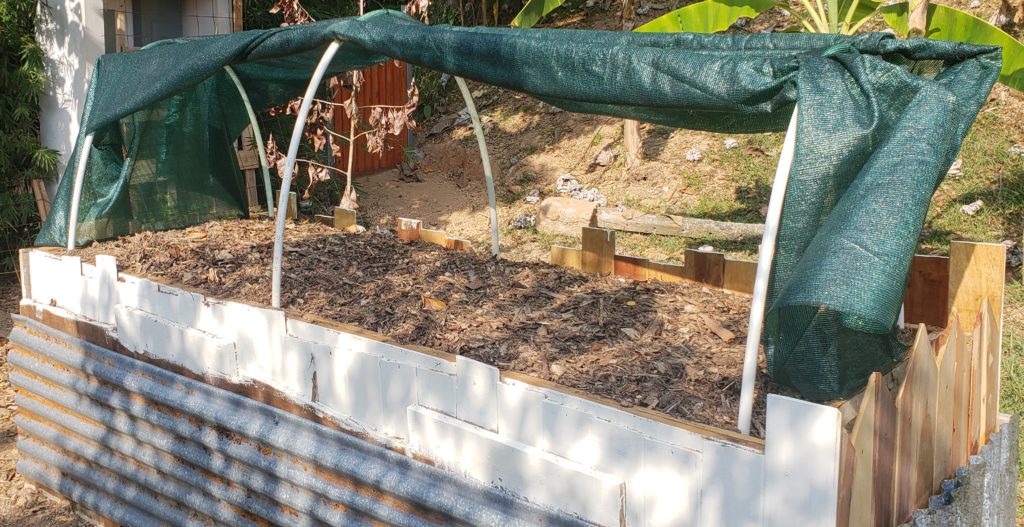 how to upcycle a raised garden bed - hoop enclosure open