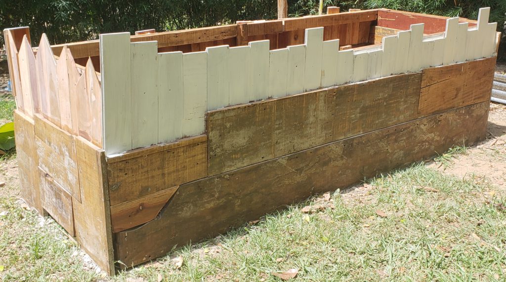 how to upcycle a raised garden bed - paint and varnish