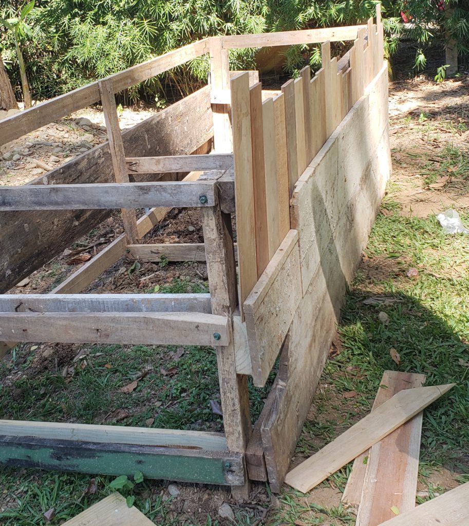how to upcycle a raised garden bed - secure frame in place